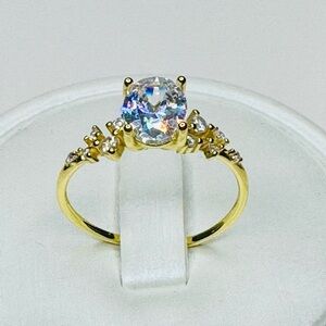 Gold Solitaire Ring with Clear Center Stone